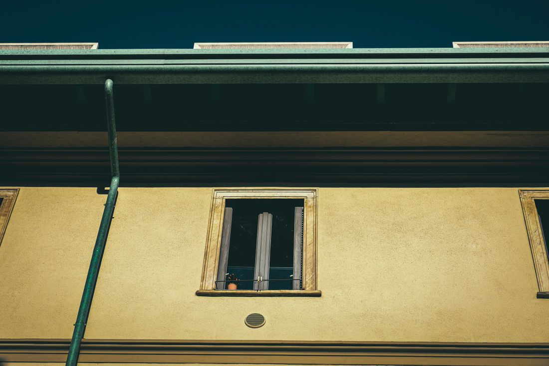 Clean gutter and downspout channeling water away