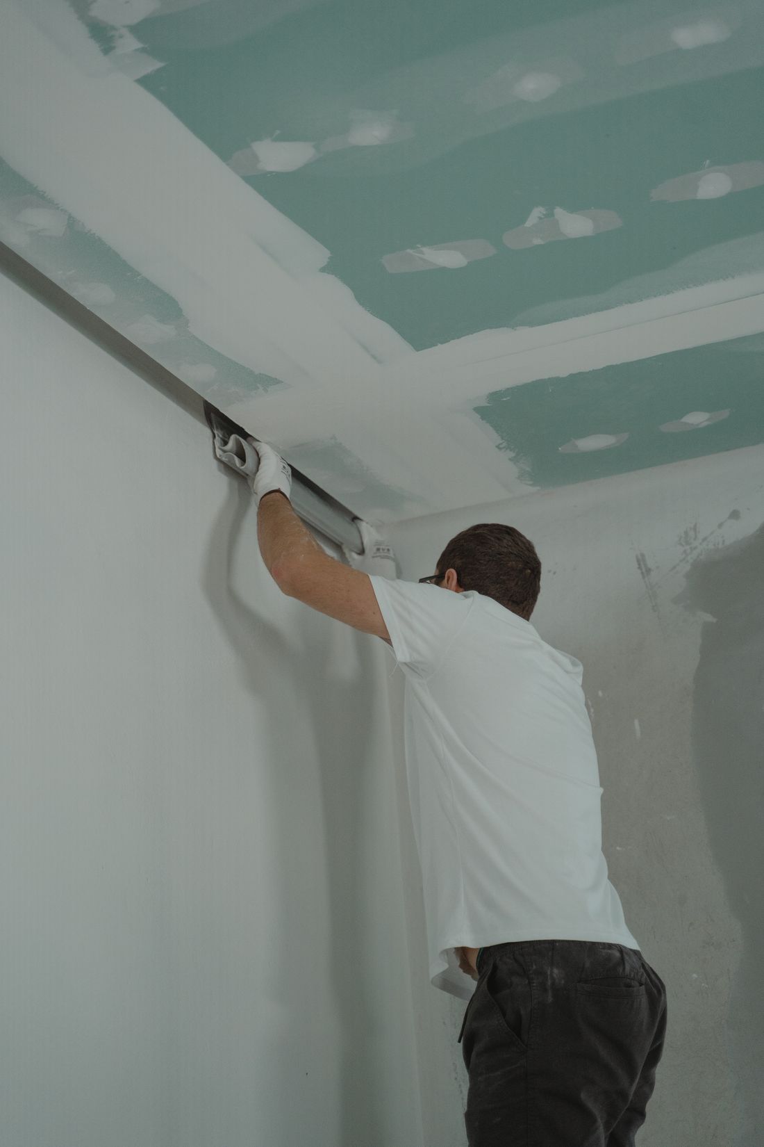 Installing and finishing drywall inside a home