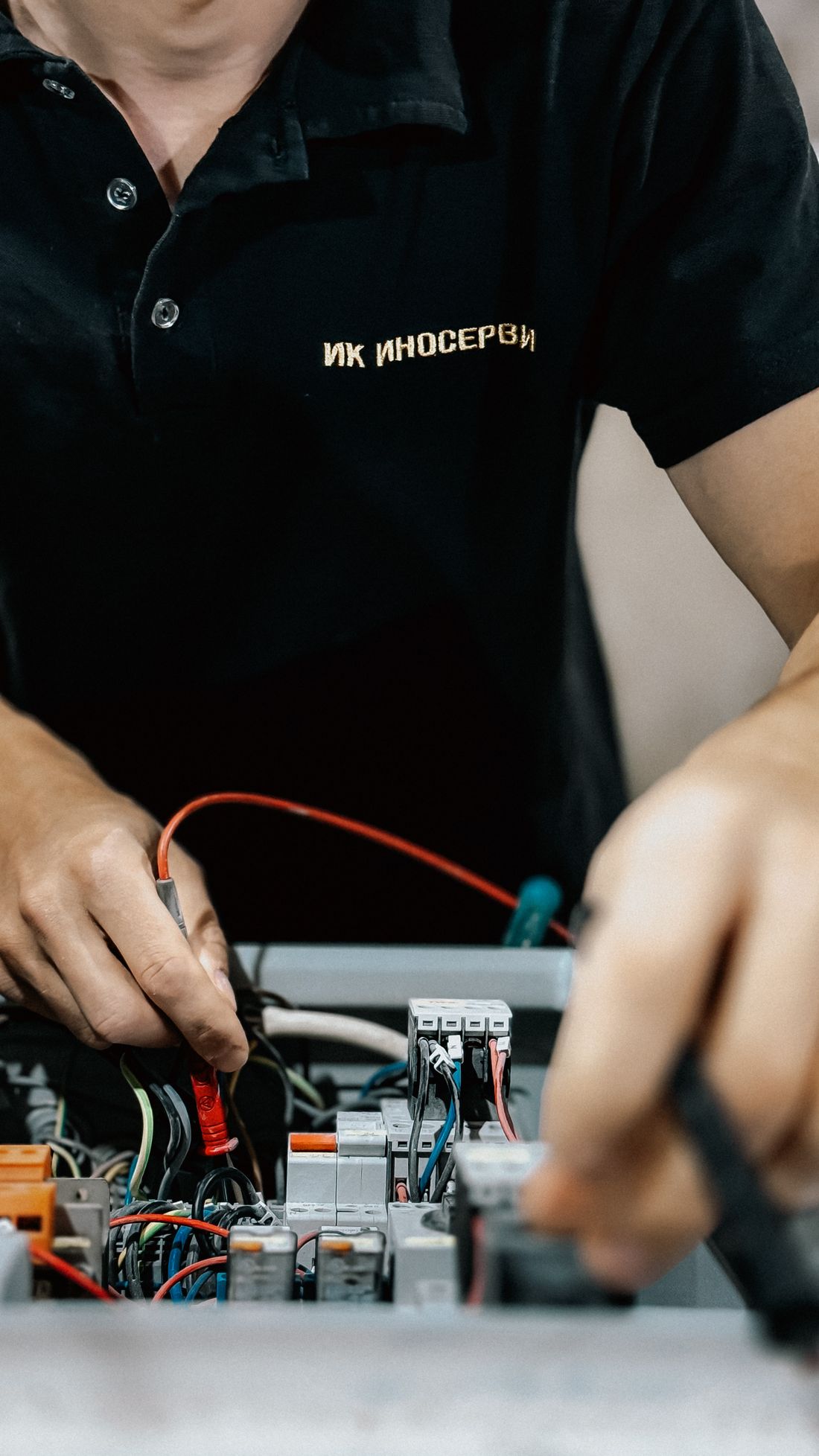 Electrician testing a home safety system
