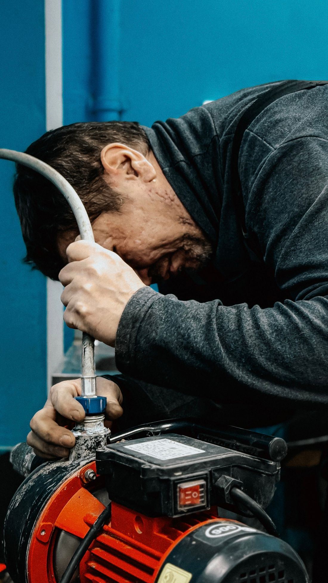 Technician servicing a home water system